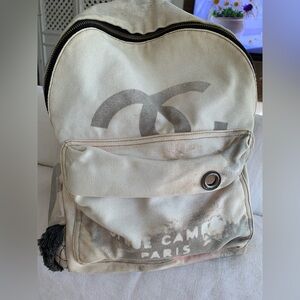 Stylish Denim Beige Backpack with Silver Zipper